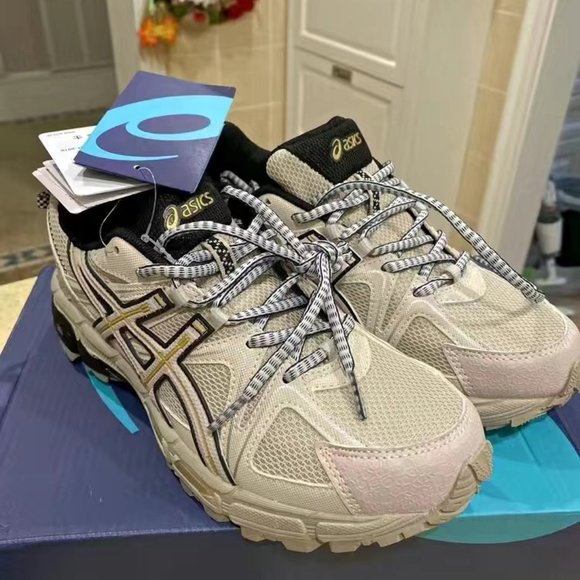 ASICS outdoor cross-country running shoes shock absorption...